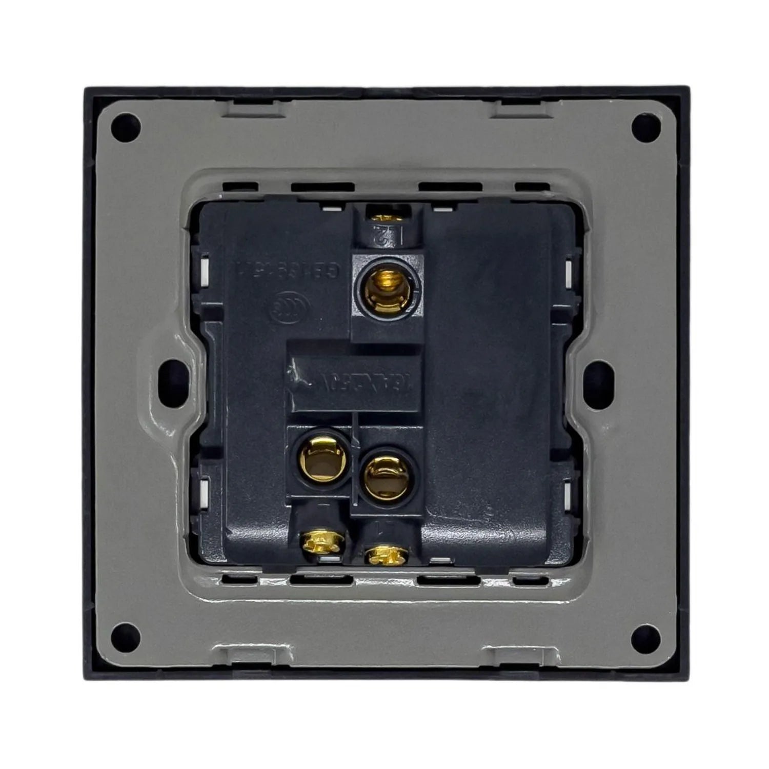 Rear view of black light switch showing internal wiring terminals with brass contact points mounted on gray backing plate.