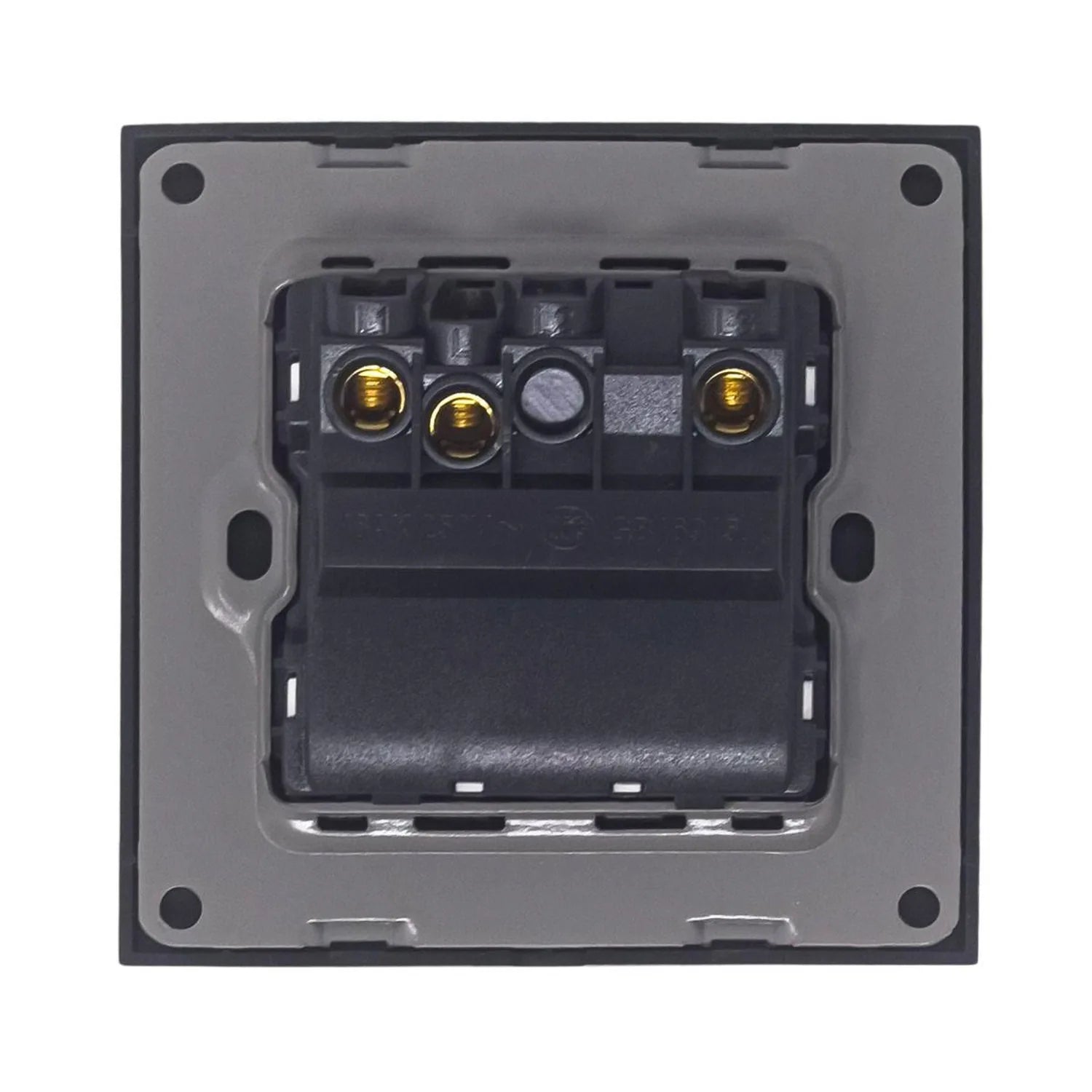 Rear view of electrical switch showing internal mechanism with brass terminals and black plastic housing mounted on gray back
