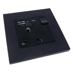 Black 1-gang switched socket outlet with USB-A and USB-C ports, shown from angled front view.