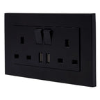 Black 2-gang switched socket outlet with two USB ports, shown as a product shot against white background.