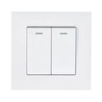 Two-gang two-way light switch in white with raised slim design and indicator lights, shown installed on white wall.