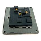 Brushed gold single switched socket with black internal mechanism and brass terminals, viewed from above showing internal com