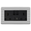 Brushed stainless steel wall socket outlet with two switches, two USB ports, and four rectangular sockets arranged on black f