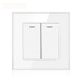 White double-gang light switch with tempered glass panel and two toggle switches with indicator lights, mounted on white wall