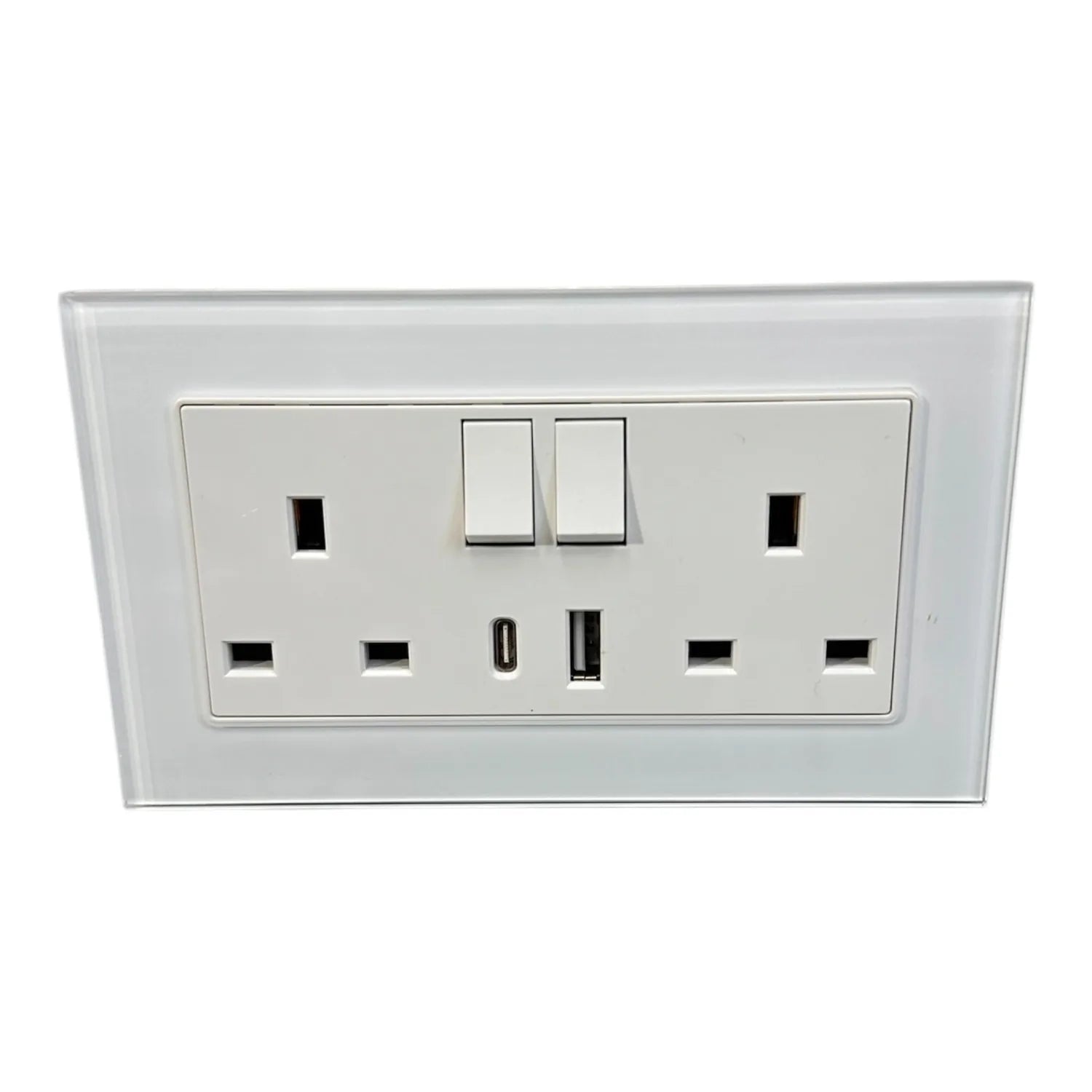 White dual switched electrical outlet with two USB ports on tempered glass panel, mounted on wall.