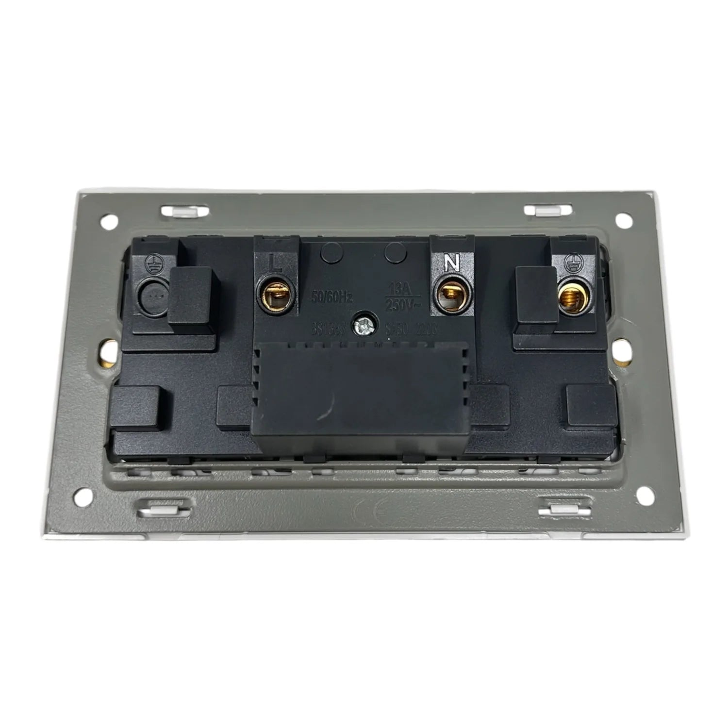 Rear view of a 2-gang electrical socket with internal wiring terminals and brass contacts mounted on gray backing plate.