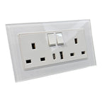 White tempered glass electrical outlet plate with two switches and dual USB ports, angled product view.