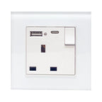 White wall-mounted socket outlet with single switch, USB-A port, USB Type-C port, and two rectangular power receptacles.