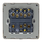 Rear view of electrical switch terminal block showing brass screw connectors and numbered wiring positions on gray backing pl
