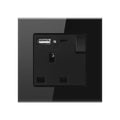 Black tempered glass wall socket with USB ports, shown from front view displaying USB-A and USB-C charging ports, power outle