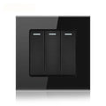 Black tempered glass 3-gang light switch with three vertical rectangular buttons, each marked with a white indicator line, mo