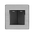 Two-gang two-way light switch with brushed steel plate and black rocker switches, front product view.