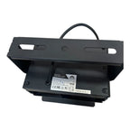 Black LED flood light shown from rear angle displaying mounting bracket, handle, heat sink, and certification label with spec