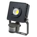 Black LED security floodlight with yellow bulb and motion sensor mounted on bracket, product photo on white background.