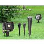 Outdoor stake light brackets in varying heights displayed on grass, compatible with multiple Philips LED flood light models.