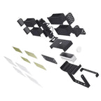 Exploded view of LED flood light components including black metal housing parts, mounting brackets, adhesive pads, and protec