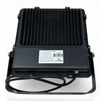 Black LED floodlight with ribbed aluminum heat sink, shown from rear view displaying product label and power cable.