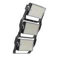 Three-module LED flood light with adjustable brackets and control knobs, shown against white background.
