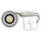 LED AR111 spot light bulb with yellow diodes, power driver, and white dimmer switch control mounted on wall plate.
