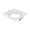 White square recessed ceiling light fixture with gimbal ring and orange adjustment handles, shown against white background.