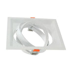 White rectangular recessed light fixture housing with adjustable gimbal ring and spring clips, isolated on white background.