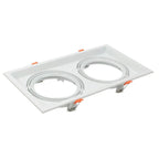 White rectangular recessed ceiling light fixture with two oval openings and orange adjustment tabs, product shot on white bac