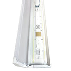 Top-down view of rectangular LED ceiling light with white frame, control markings, and gold panel detail.