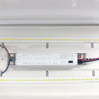 LED driver installation shot showing Lifud model HF-FMR060C5(S) mounted between two LED light strips with wiring connections 