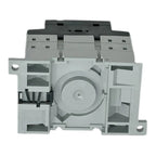 Top view of ABB 3-pole PV isolator showing internal mechanism with central rotary switch and terminal connections, disassembl