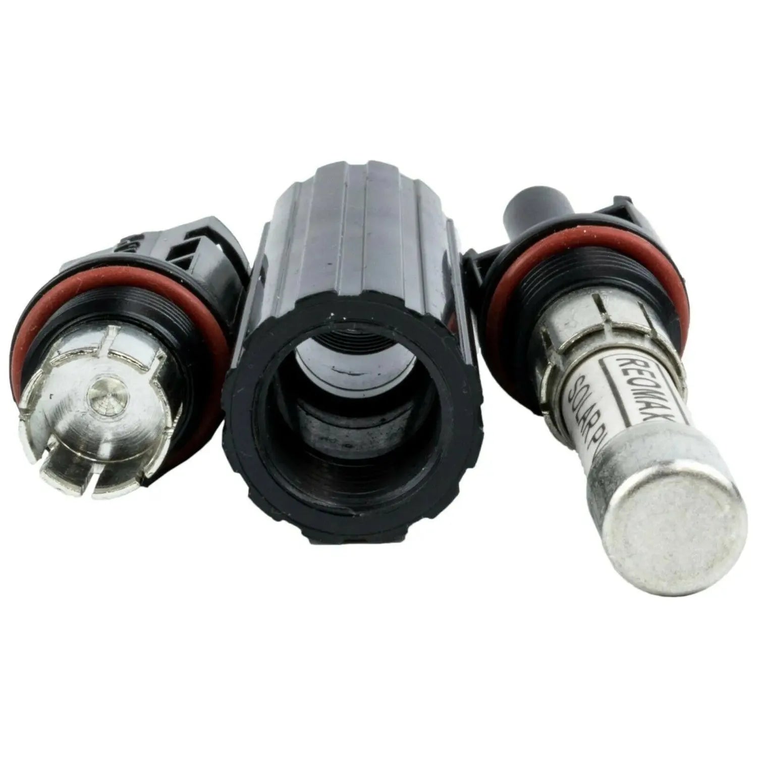 Three MC4 solar panel connectors with 15A inline fuses displayed disassembled, showing male and female ends with red and blac