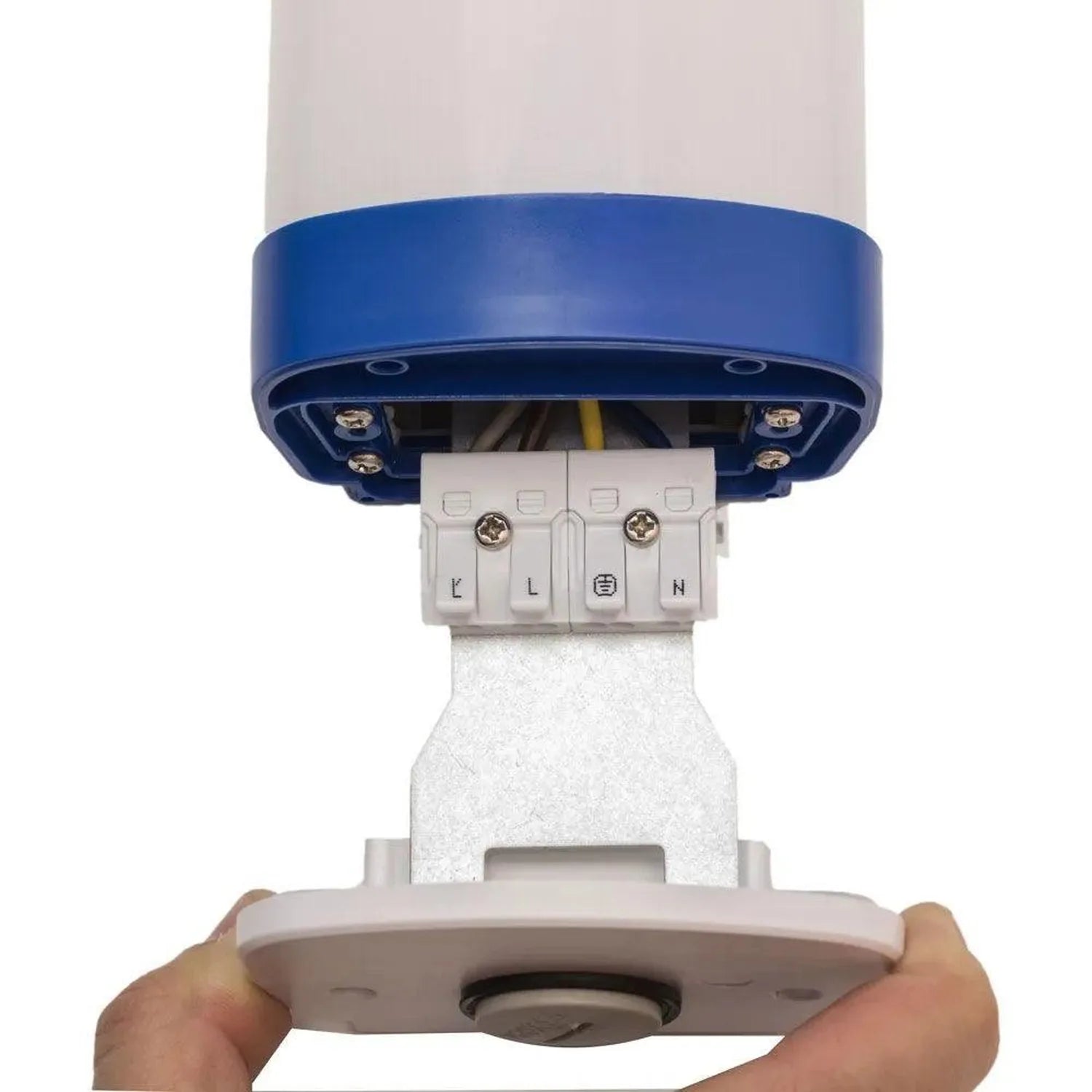 Blue LED tri-proof light fixture with terminal connections exposed, held in hands showing installation detail.