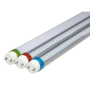 Four T8 LED tube lights arranged diagonally with colored ring labels in green, red, and blue indicating different specificati