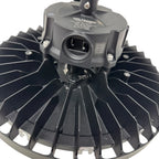 Voltaron LED high bay light fixture viewed from below, showing black radial heat sink fins and central optical head with moun
