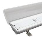 LED non-corrosive light fitting with white housing, removable polycarbonate cover, and array of small white LED bulbs visible