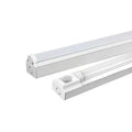 Two white LED batten ceiling lights displayed at angles, one with a motion sensor attachment visible on its surface.