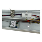 LED batten light wiring installation showing white switch module labeled "Power Off Before Switching" mounted on aluminum rai