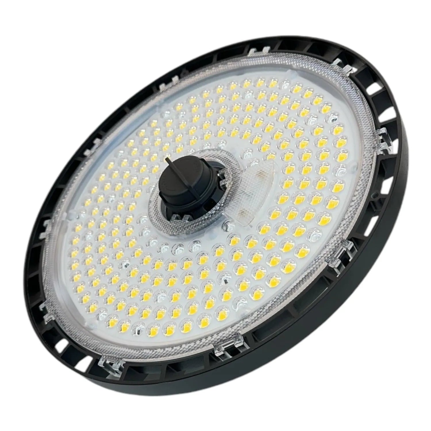 LED high bay light with black rim and white circular lens packed with yellow LED chips, shown against white background.