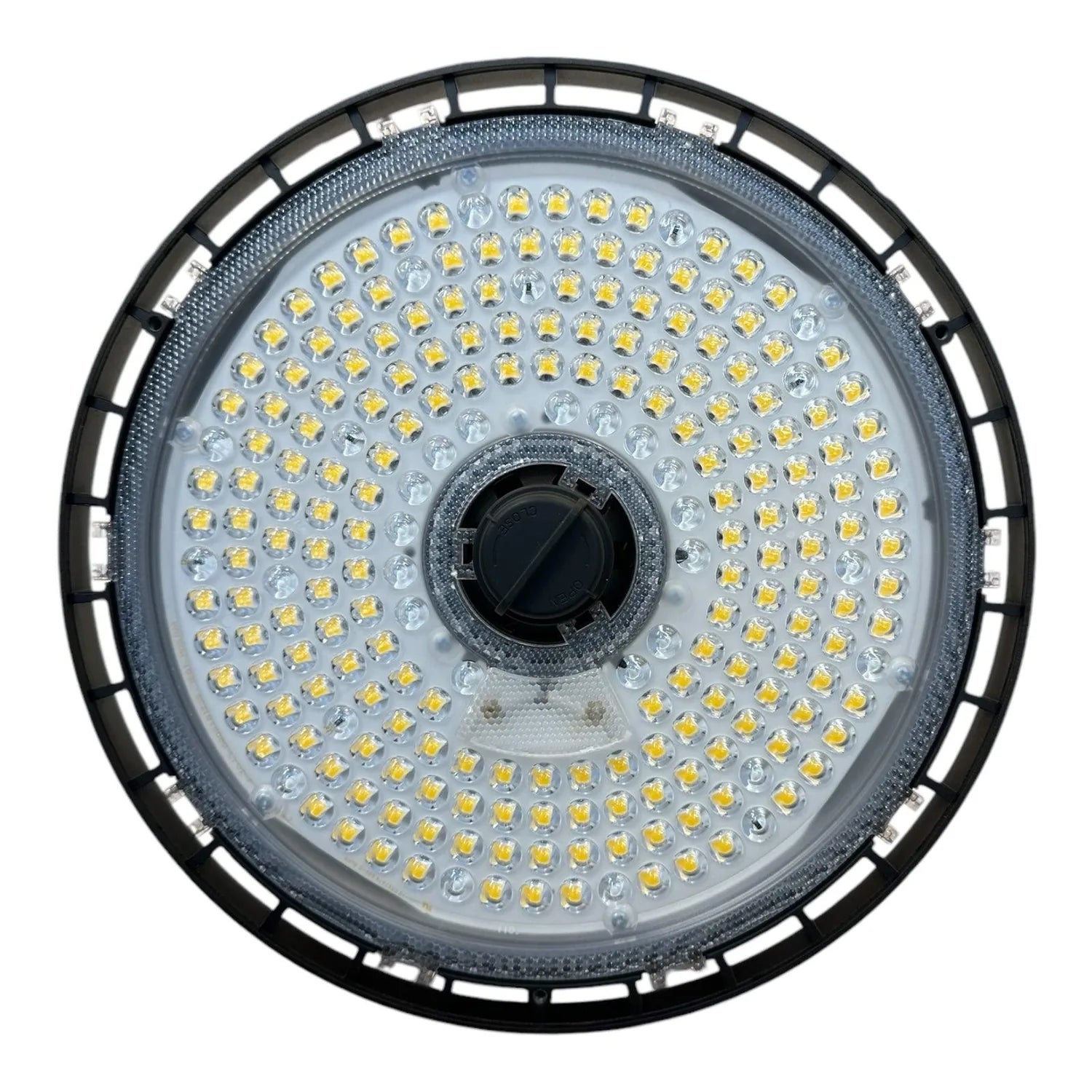 Top-down view of round LED high bay light with black rim, gray aluminum base, and array of yellow-tinted LED chips surroundin
