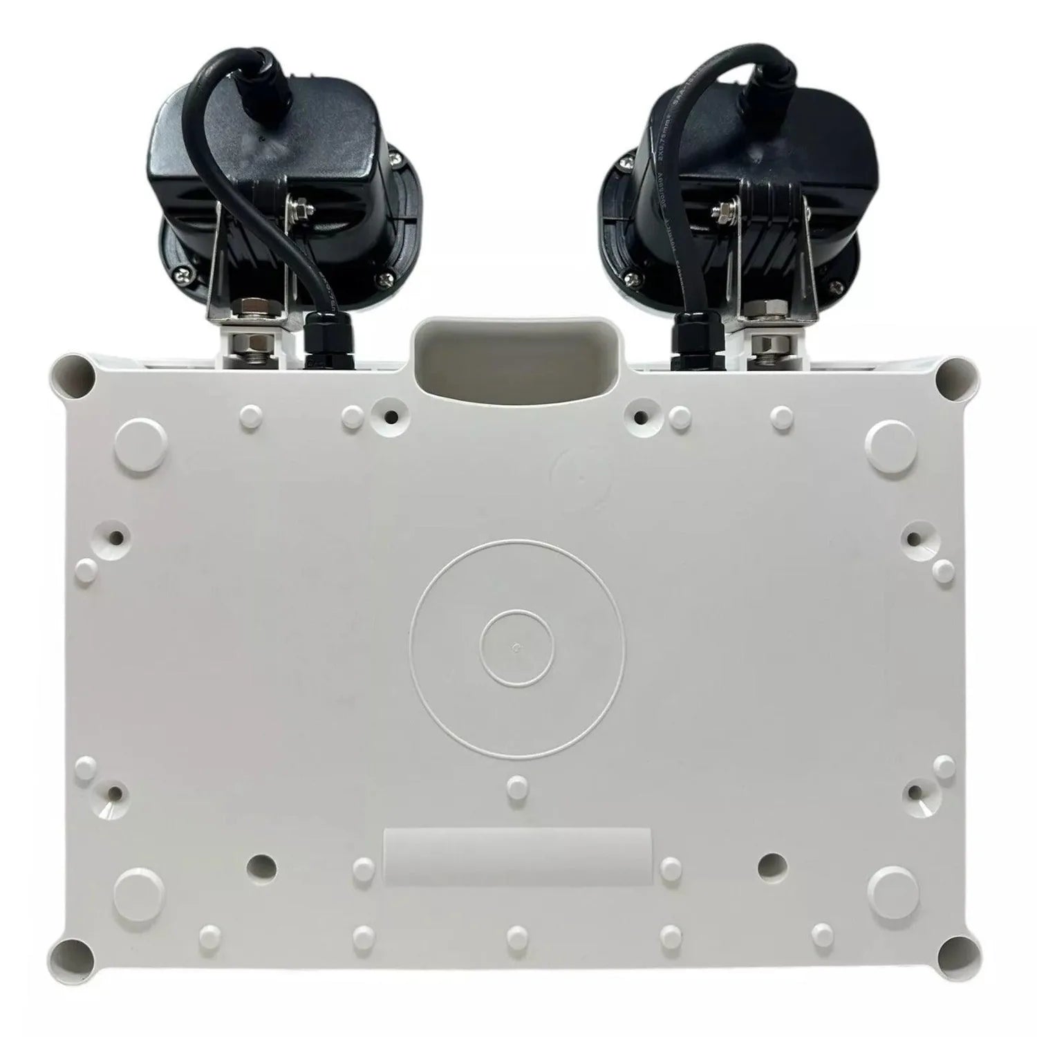 Top-down view of white emergency spotlight fixture showing dual black lamp heads and mounting surface with circular fixture o