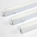 Three white LED under-cabinet tube lights displayed at angles, showing cylindrical design with integrated on-off switches.
