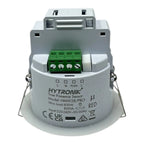 Hytronik HMW28/PRO ceiling-mounted motion sensor switch with green terminal block, showing 800W max load rating and CE certif