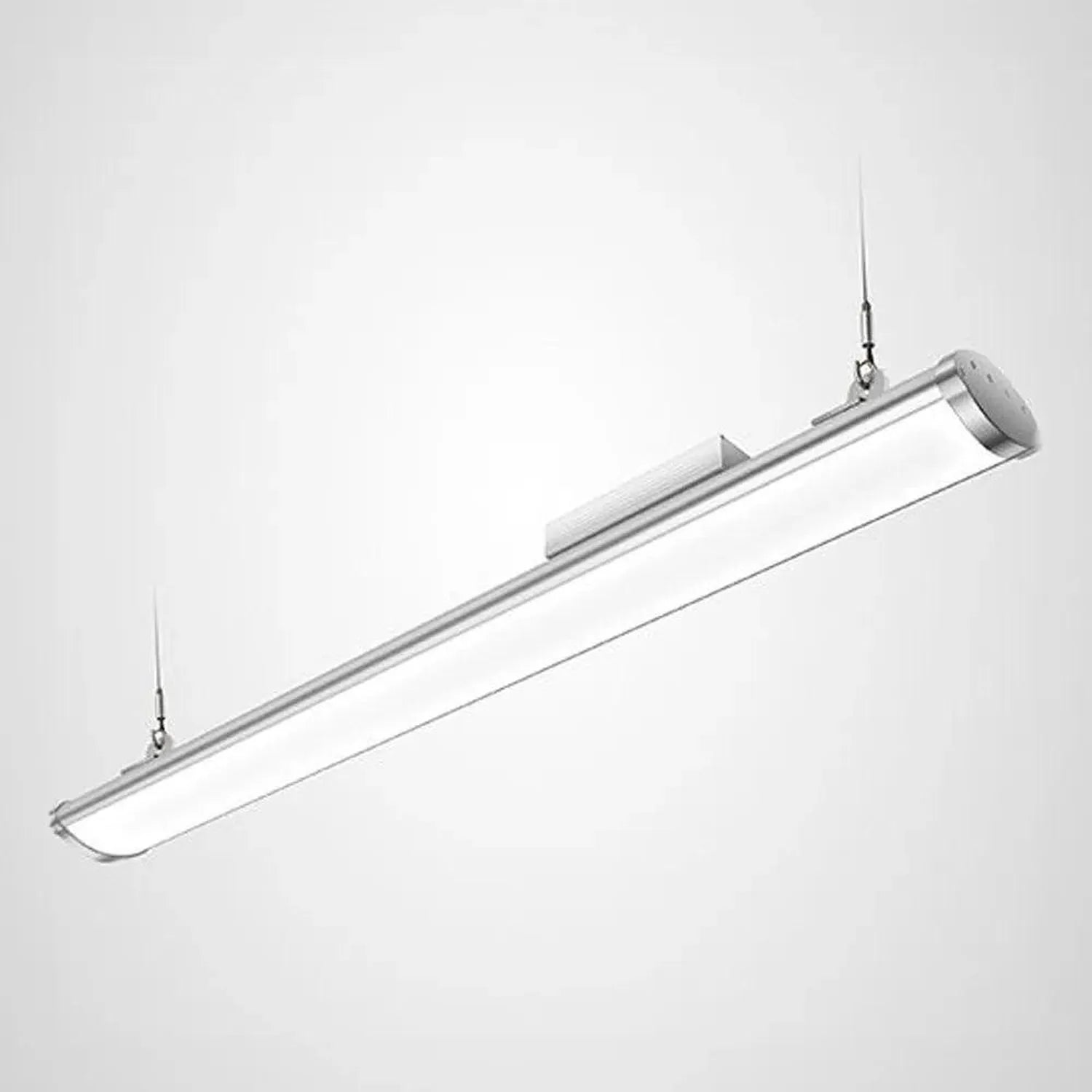 Sleek silver linear LED high bay light suspended by two cables against white background, product shot.
