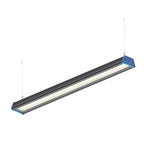 Linear LED high bay light with blue end caps, black housing, and honeycomb reflector pattern, shown suspended by chains on wh