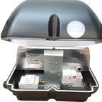 Voltacon LED wall pack disassembled showing dome housing, internal motor and electrical components including control modules 
