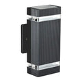 Black rectangular LED wall light with ribbed texture, clear glass panels, and upward-downward lighting design, isolated on wh