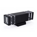 Black rectangular LED wall light with clear lens sections on sides, shown as product isolated on white background.