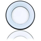 Round LED ceiling light with light blue ring and white center, shown with reflection below.