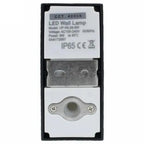 Rear view of LED wall lamp showing specifications label, mounting bracket with two screw holes, and cable entry port.
