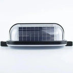Solar wall light with integrated solar panel on clear dome, black trim and mounting brackets, front product view.