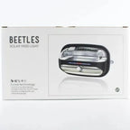 Beetles solar yard light product packaging showing rectangular black and silver motion-sensor light fixture with LED design.